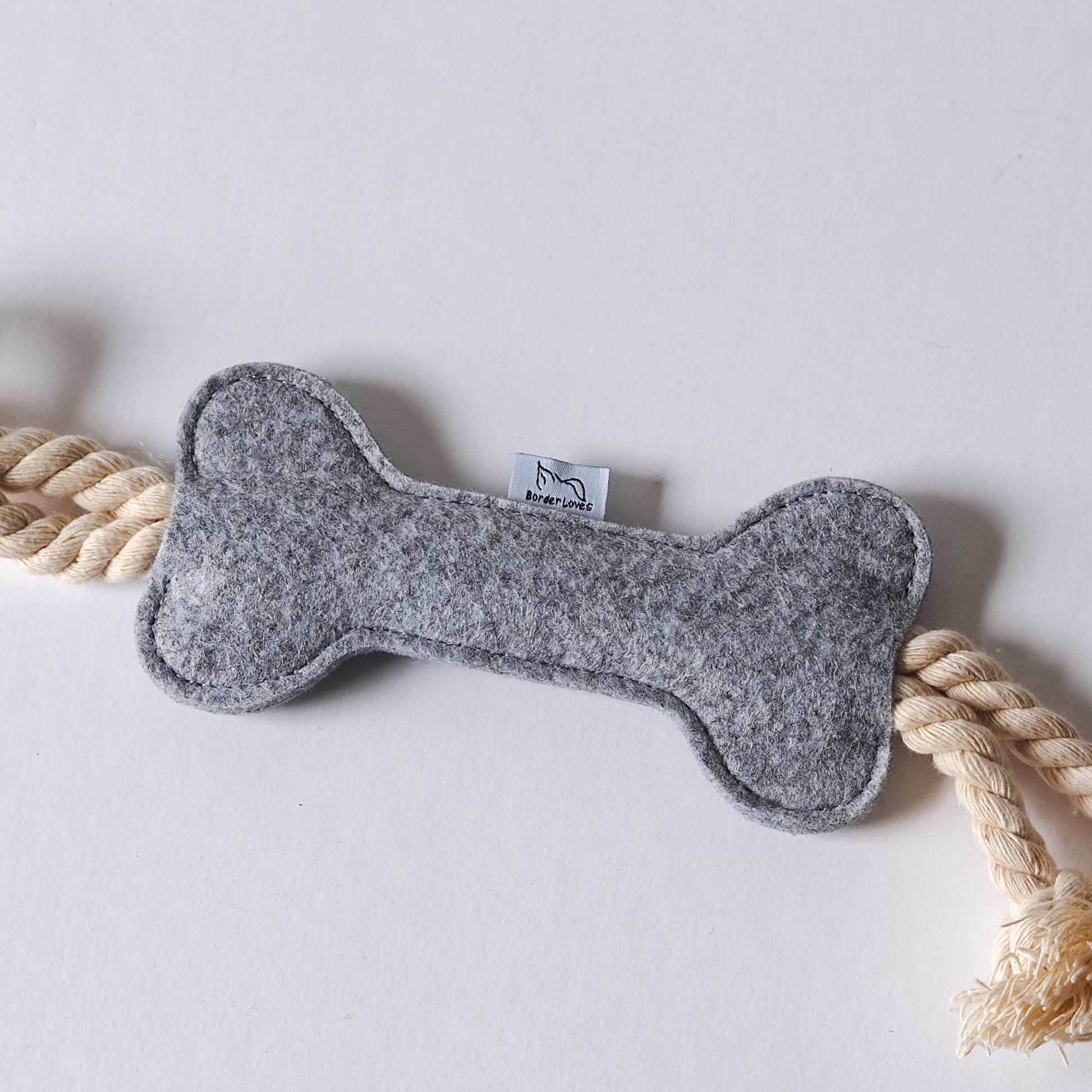 grey rope dog toy by border loves