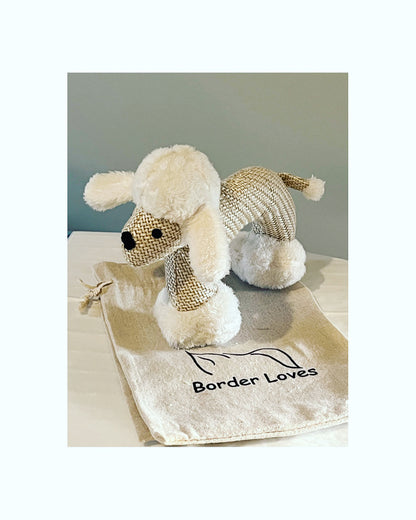 Squeaky Sheep Dog Toy standing on its cotton gift bag by Border Loves