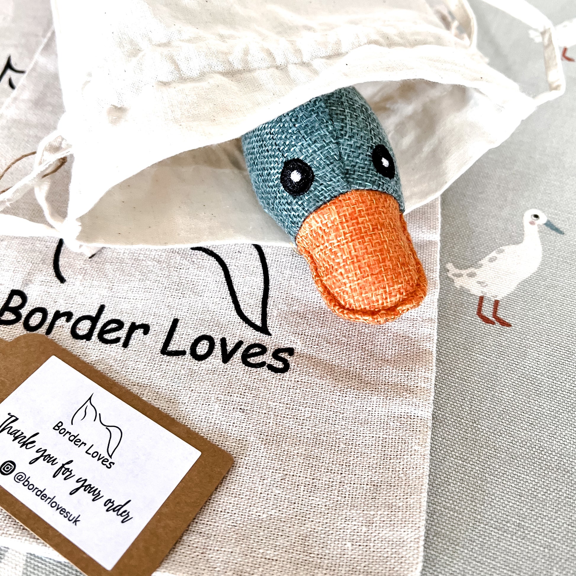 squeaky duck dog toy tag and cotton gift bag by Border Loves